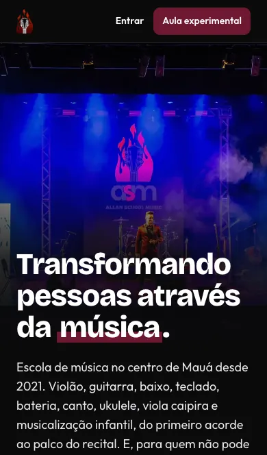 Site da Allan School Music no celular, com a foto do palco da escola.